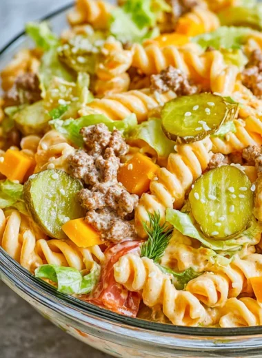 Big Mac Pasta Salad featuring pasta, lettuce, cheese, and burger flavors