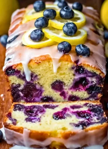 Creamy blueberry yogurt in a bowl garnished with fresh blueberries