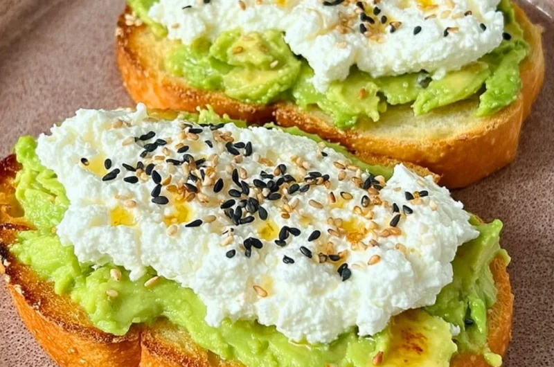 Cottage cheese toast topped with fresh herbs and vegetables
