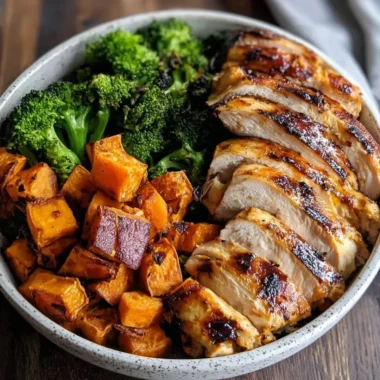 Grilled chicken served with sweet potato in a colorful bowl
