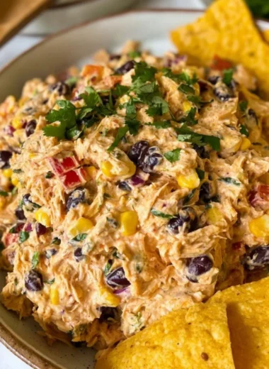 High-Protein Southwest Chicken Salad with fresh vegetables and grilled chicken.