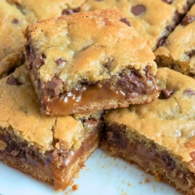 Homemade Knock You Naked Bars with layers of chocolate and caramel
