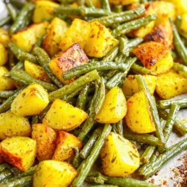 A vibrant dish of potatoes and green beans cooked to perfection.