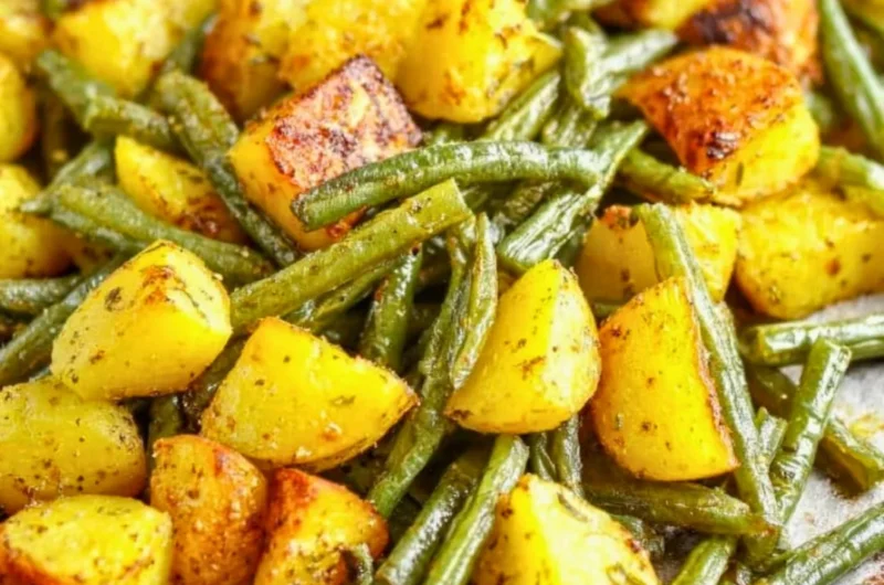 A vibrant dish of potatoes and green beans cooked to perfection.