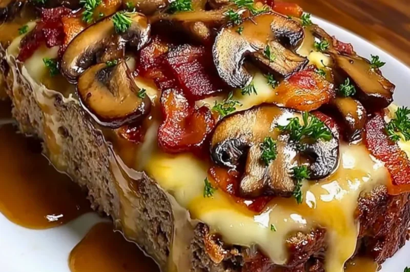 Delicious Swiss Bacon Mushroom Meatloaf served on a plate