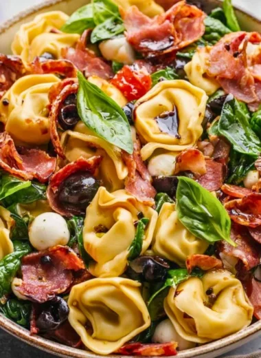 Delicious Tuscan Tortellini Salad with fresh ingredients and vibrant colors