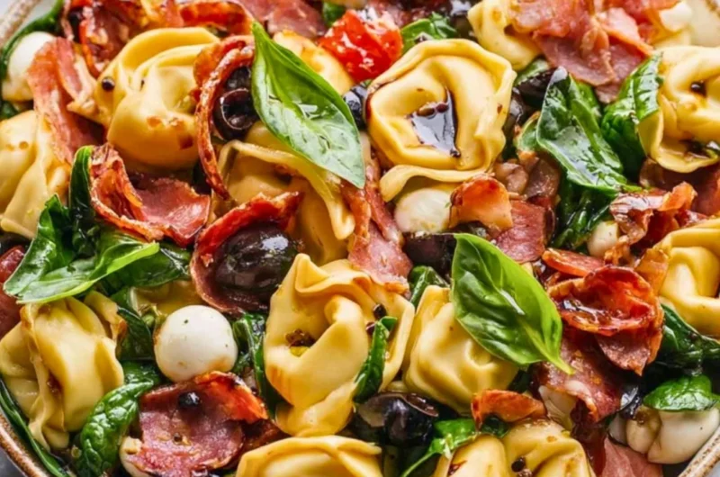 Delicious Tuscan Tortellini Salad with fresh ingredients and vibrant colors