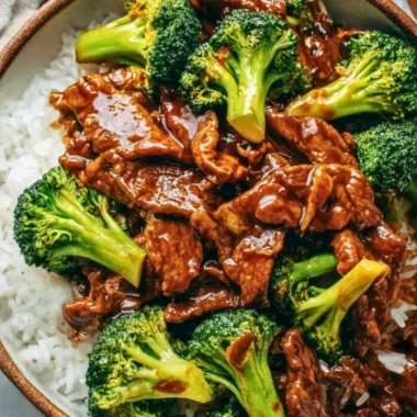 Delicious plate of Chinese beef and broccoli served with rice