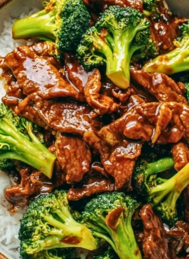 Delicious plate of Chinese beef and broccoli served with rice
