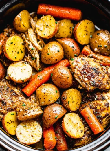 Delicious Garlic Butter Chicken prepared in a crockpot for tender, flavorful meals.