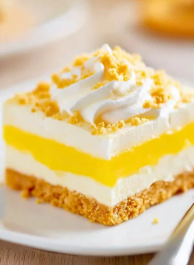 Heavenly Oreo Lemon Dessert with a crunchy crust and creamy lemon filling