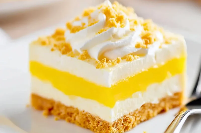 Heavenly Oreo Lemon Dessert with a crunchy crust and creamy lemon filling
