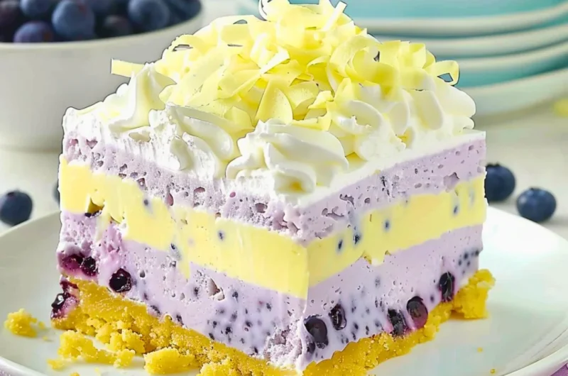Delicious lemon blueberry lasagna with layers of lemon cream and blueberries.