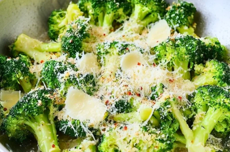 Delicious Garlic Parmesan Broccoli dish garnished with cheese and garlic