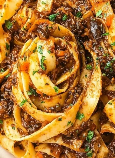 Delicious mushroom ragu served over pasta, a comforting and hearty dish.