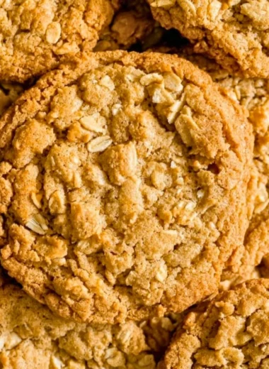 Homemade peanut butter oatmeal cookies on a wooden table