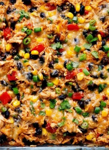 Delicious Protein Burrito Casserole topped with fresh ingredients
