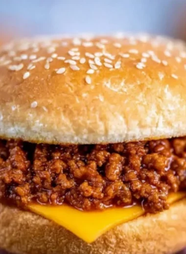 Delicious Slow Cooker Sloppy Joes served on a plate with sides.