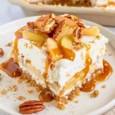 Delicious Apple Delight dessert with creamy layers and graham cracker crust