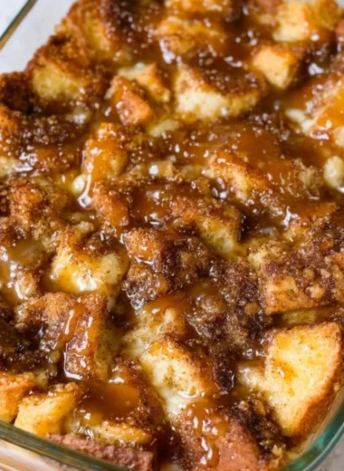 Delicious homemade bread pudding with caramel sauce and whipped cream