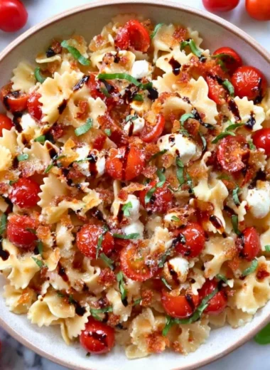 Fresh Bruschetta Pasta Salad with tomatoes, basil, and pasta.