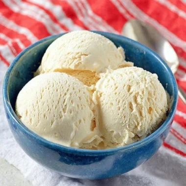 Delicious Cold Stone cake batter ice cream topped with colorful sprinkles