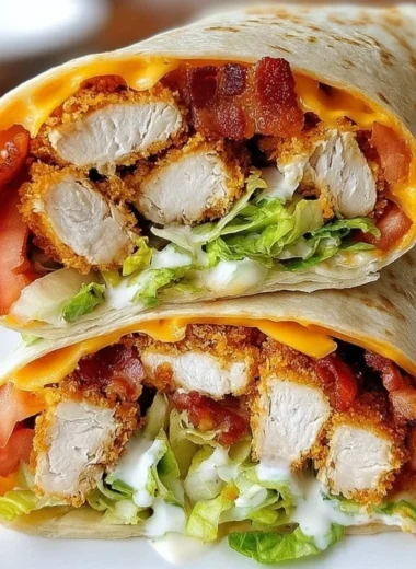 Crispy chicken bacon ranch wrap with fresh ingredients and flavorful dressing