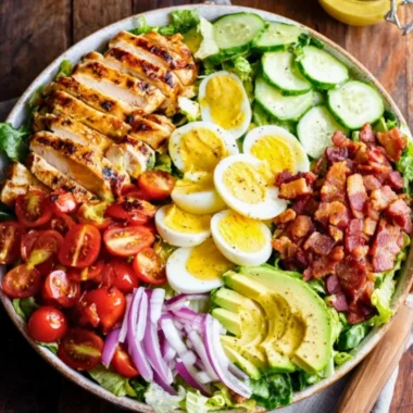 Grilled Chicken Cobb Salad with fresh vegetables and toppings