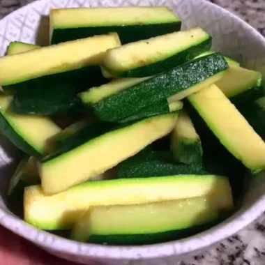 Crispy Keto Zucchini Fries served on a plate with dipping sauce
