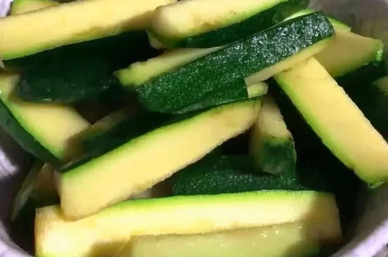Crispy Keto Zucchini Fries served on a plate with dipping sauce