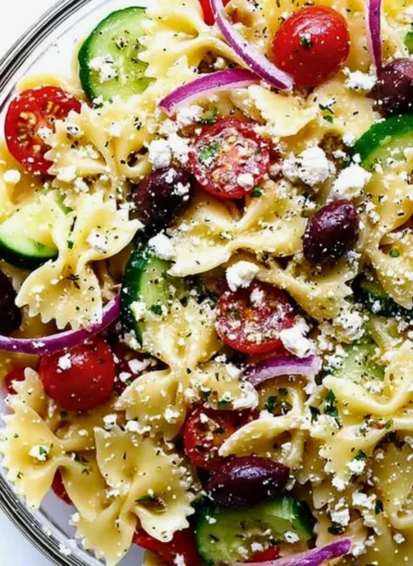 Colorful Mediterranean Pasta Salad with fresh vegetables and herbs