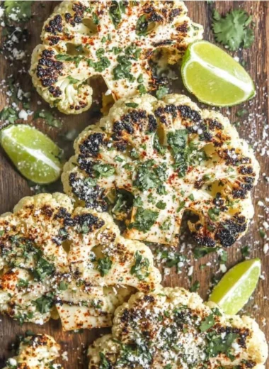 Plate of Mexican Street Cauliflower (Elote) topped with spices and cheese