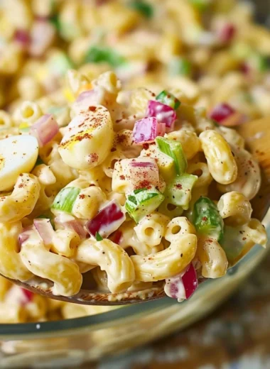 A delicious bowl of Southern Macaroni Salad loaded with vegetables and creamy dressing