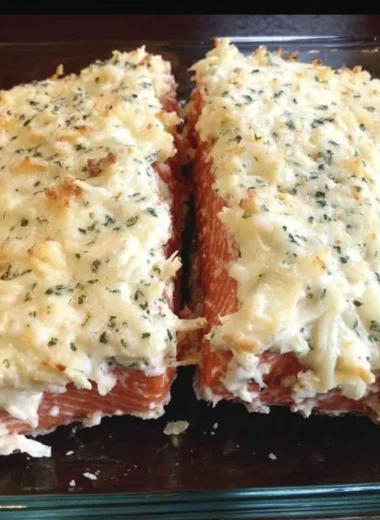 Baked salmon with a parmesan and herb crust topped with mayo