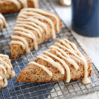 Freshly baked banana bread scones on a wooden table