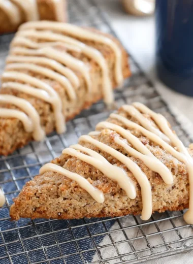 Freshly baked banana bread scones on a wooden table