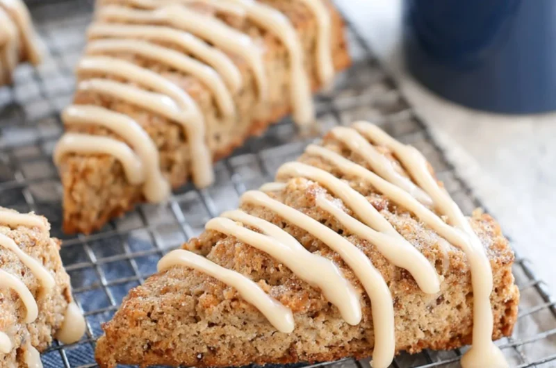 Freshly baked banana bread scones on a wooden table