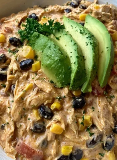 Delicious Crock Pot Fiesta Chicken with vibrant spices and ingredients.