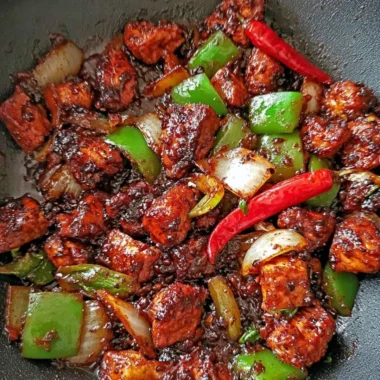 Delicious easy black pepper chicken served with vegetables.