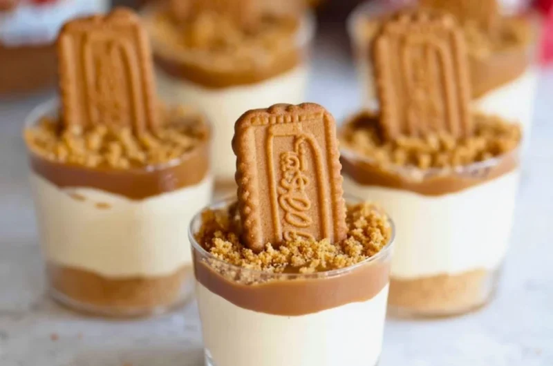 Delicious no bake Biscoff cheesecake cups topped with cookie crumbles