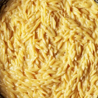 Protein-packed cottage cheese orzo dish served in a bowl with vegetables