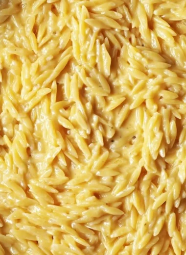 Protein-packed cottage cheese orzo dish served in a bowl with vegetables