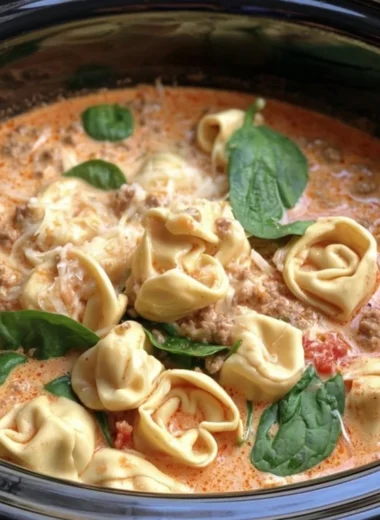 Delicious slow cooker tortellini and sausage soup in a bowl