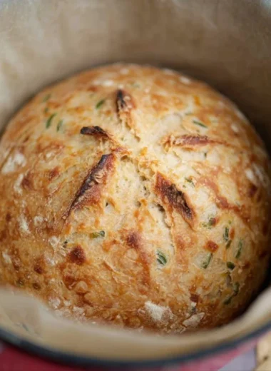 Freshly baked sourdough jalapeño cheddar artisan bread with a crispy crust