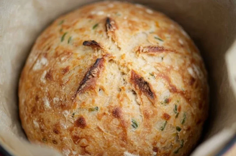 Freshly baked sourdough jalapeño cheddar artisan bread with a crispy crust