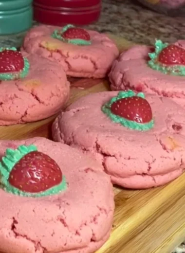 Delicious Strawberry Cheesecake Cookie Bars topped with fresh strawberries.