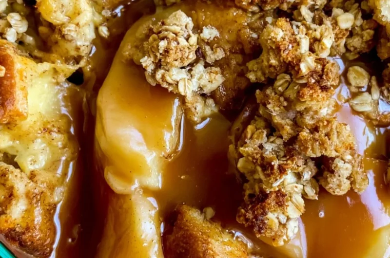 Apple Pie French Toast Casserole topped with cinnamon and apples