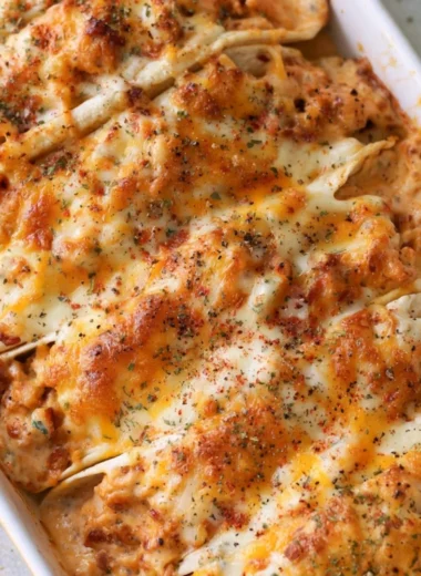 Baked chicken bacon ranch tacos served on a plate with toppings