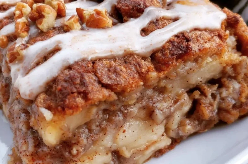 Delicious apple oat breakfast cake served on a rustic plate with autumn decorations